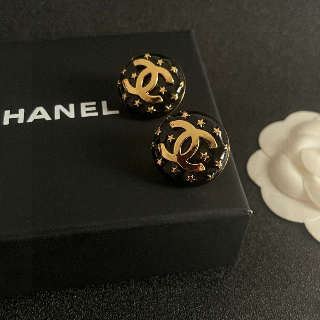 Double-C Emblem Stud Earrings in Polished Metal-Tone – Star Detail – Design 018 detail view