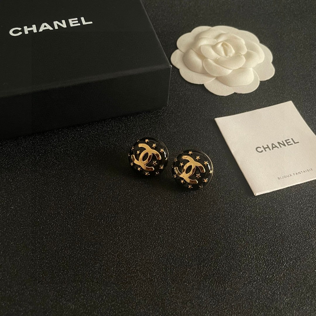 Double-C Emblem Stud Earrings in Polished Metal-Tone – Star Detail – Design 018 styled product view