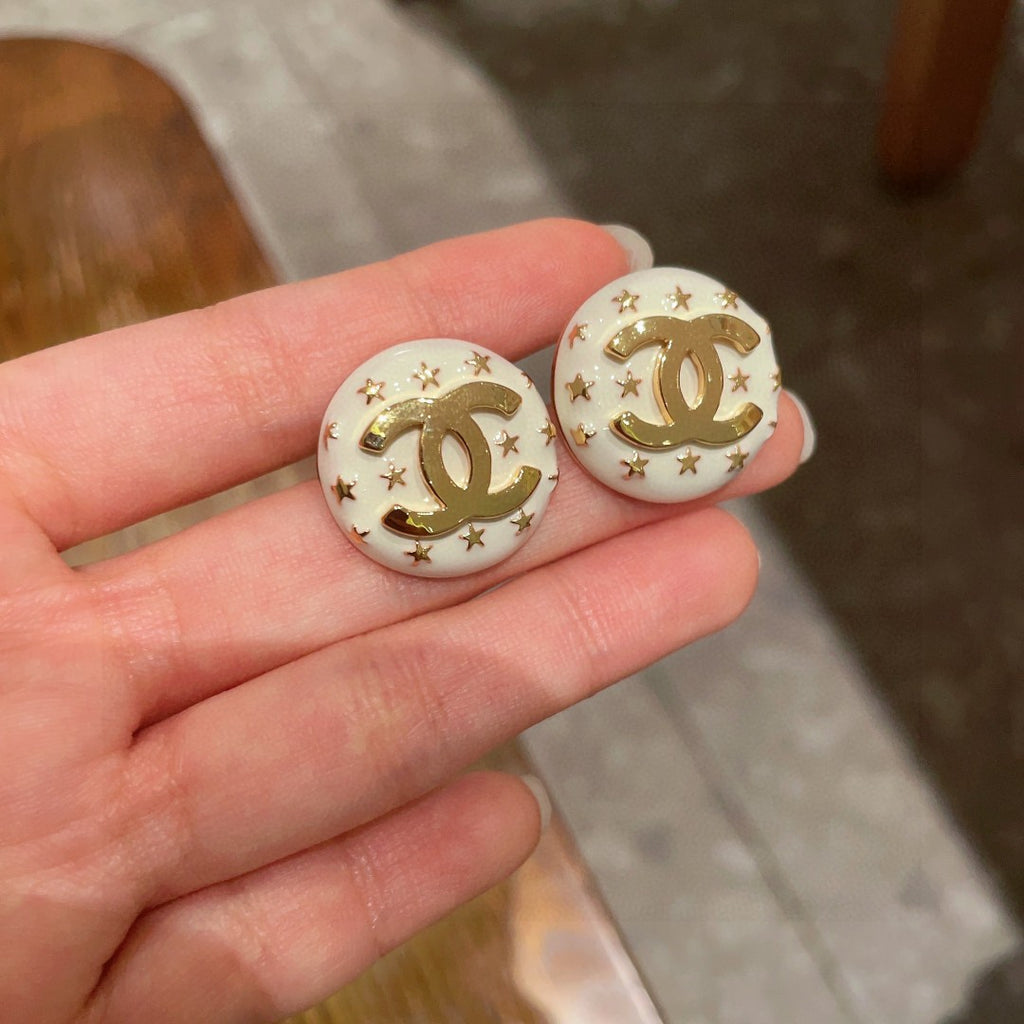 Double-C Emblem Stud Earrings in Polished Metal-Tone – Star Detail – Design 013 side detail