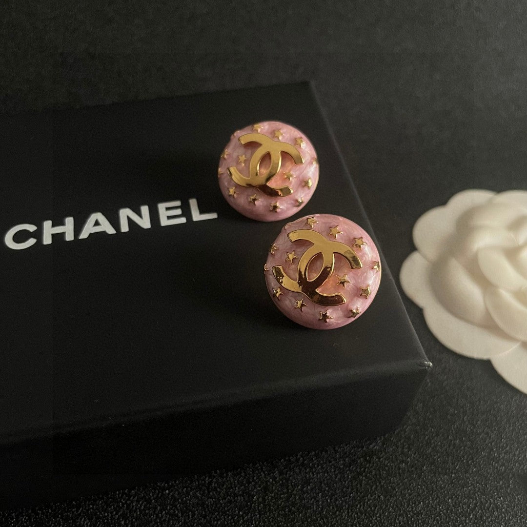 Double-C Emblem Stud Earrings in Polished Metal-Tone – Star Detail – Design 016 detail view
