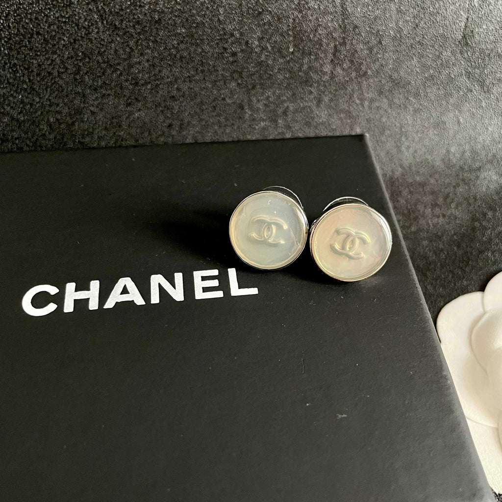 Double-C Emblem Stud Earrings in Polished Metal-Tone – Design 275 detail view