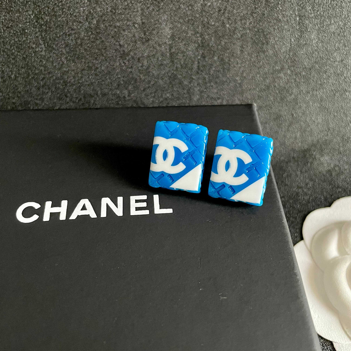 Double-C Emblem Stud Earrings in Polished Metal-Tone – Design 261 detail view