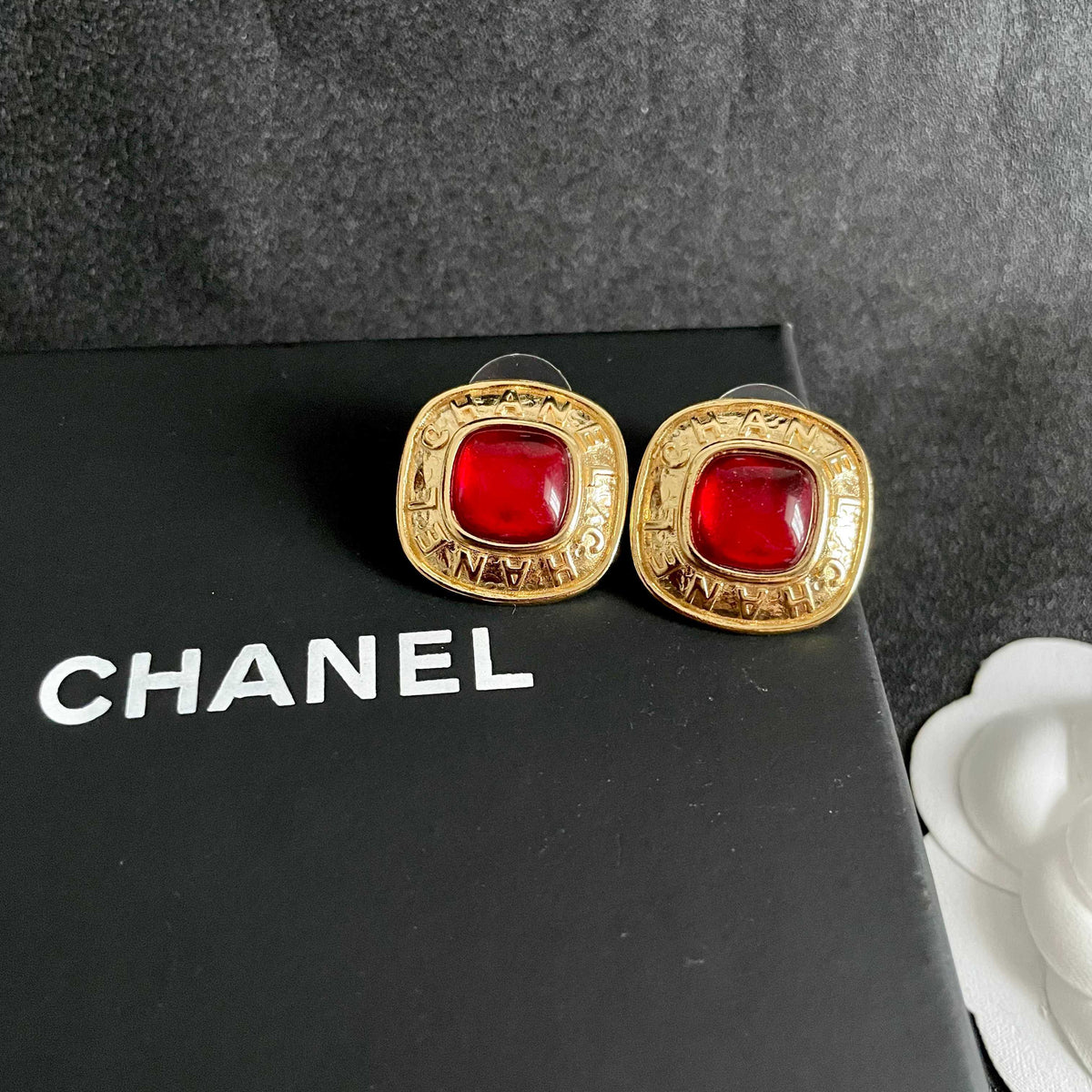 Double-C Emblem Stud Earrings in Polished Metal-Tone – Design 266 detail view