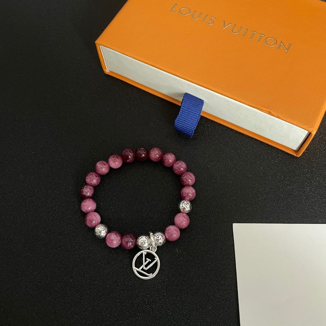 Letter Emblem Bracelet in Polished Metal-Tone – Pearl Detail close-up detail