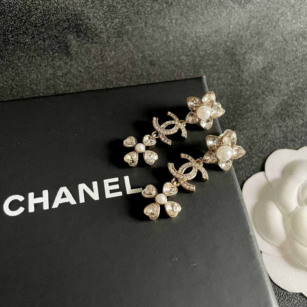 Signature Emblem Stud Earrings in Polished Metal-Tone – Design 047 detail view
