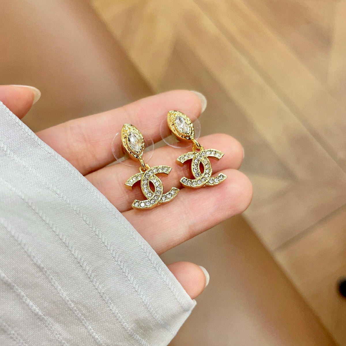 Signature Emblem Stud Earrings in Polished Metal-Tone – Design 043 side detail