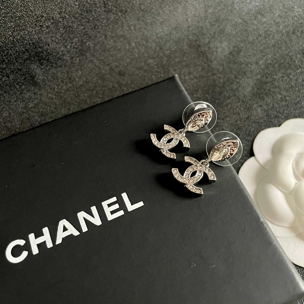 Signature Emblem Stud Earrings in Polished Metal-Tone – Design 042 detail view