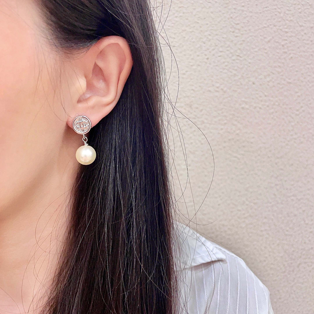 Signature Emblem Stud Earrings in Polished Metal-Tone – Design 040 detail view