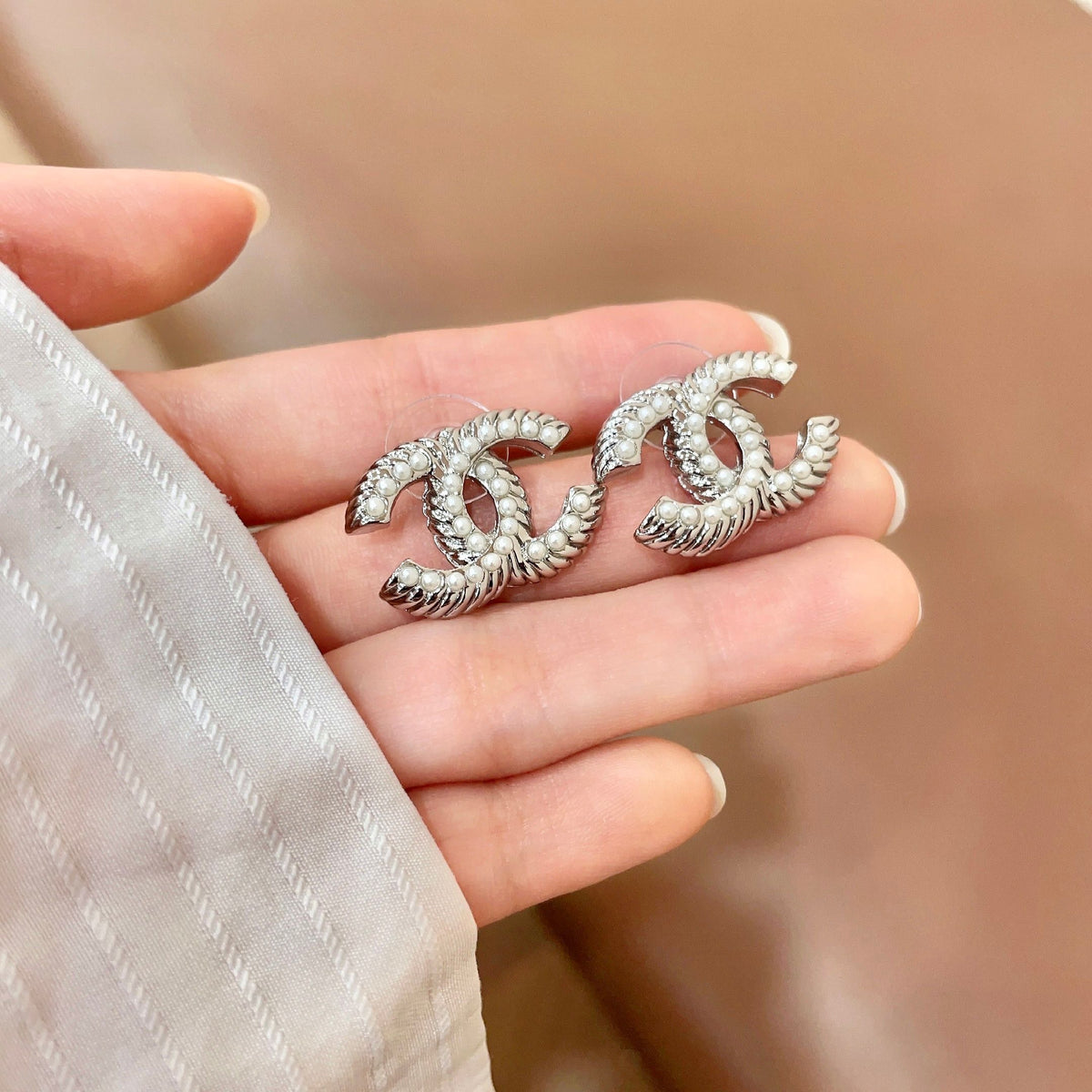 Signature Emblem Stud Earrings in Polished Metal-Tone – Design 034 side detail