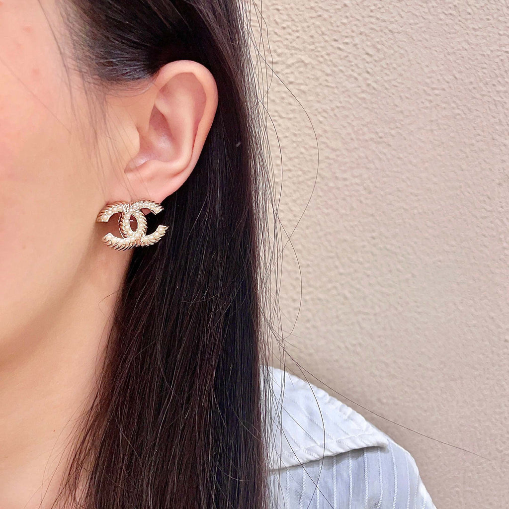 Signature Emblem Stud Earrings in Polished Metal-Tone – Design 033 detail view