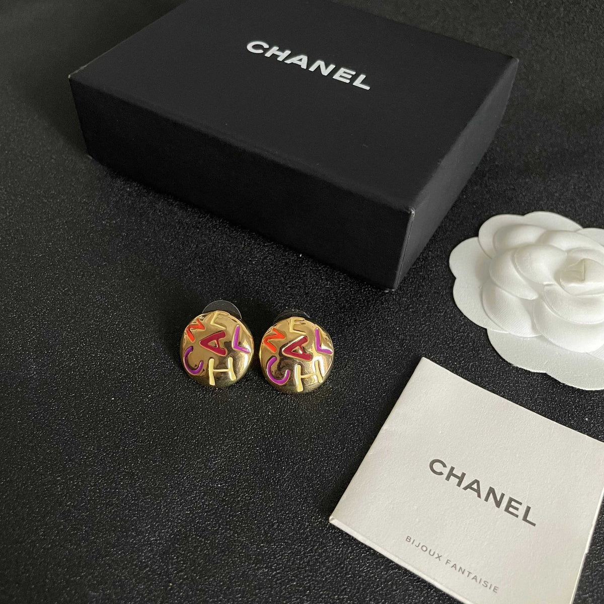 Double-C Emblem Stud Earrings in Polished Metal-Tone – Design 245 close-up detail