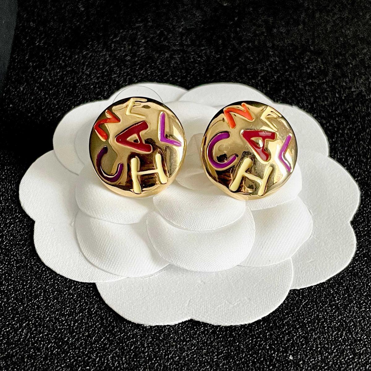 Double-C Emblem Stud Earrings in Polished Metal-Tone – Design 245 front product view