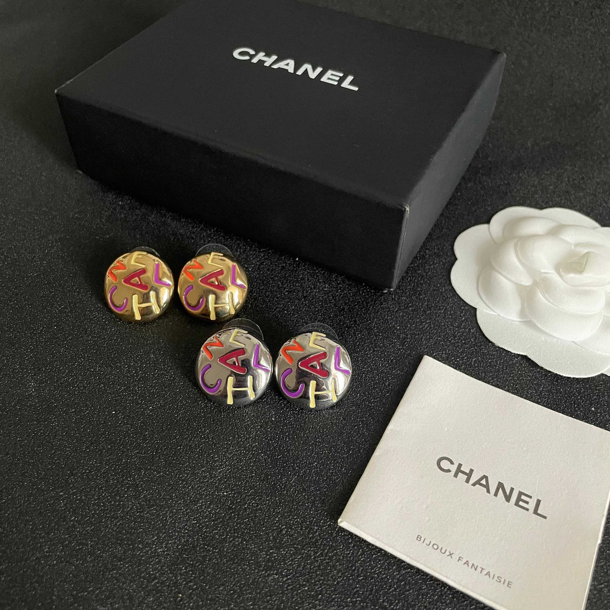 Double-C Emblem Stud Earrings in Polished Metal-Tone – Design 244 close-up detail