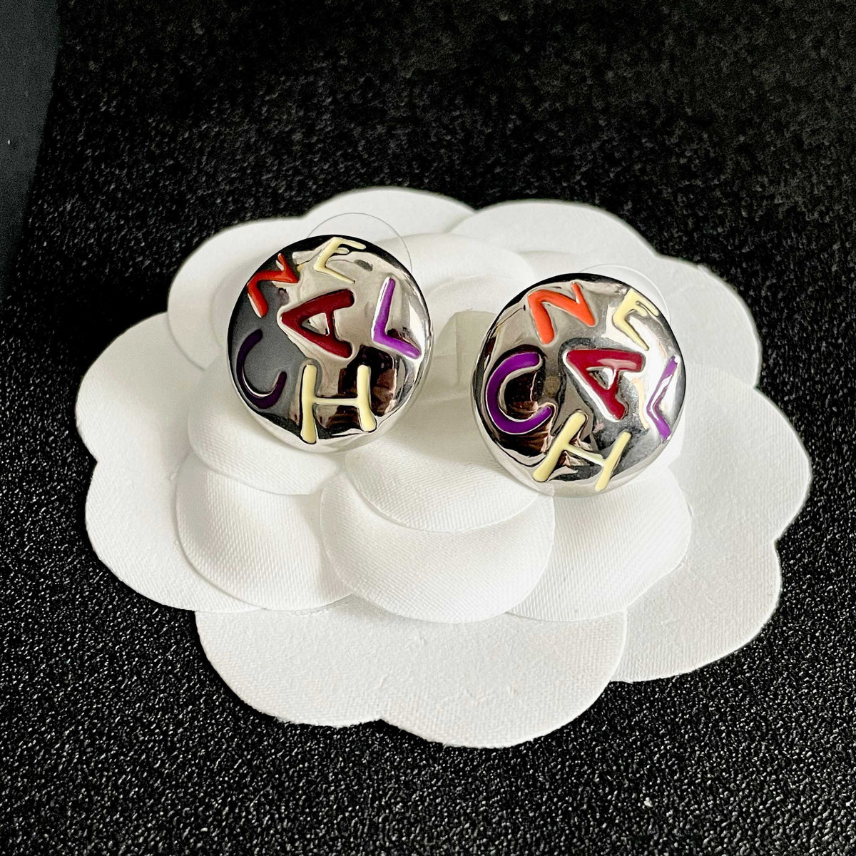 Double-C Emblem Stud Earrings in Polished Metal-Tone – Design 244 front product view