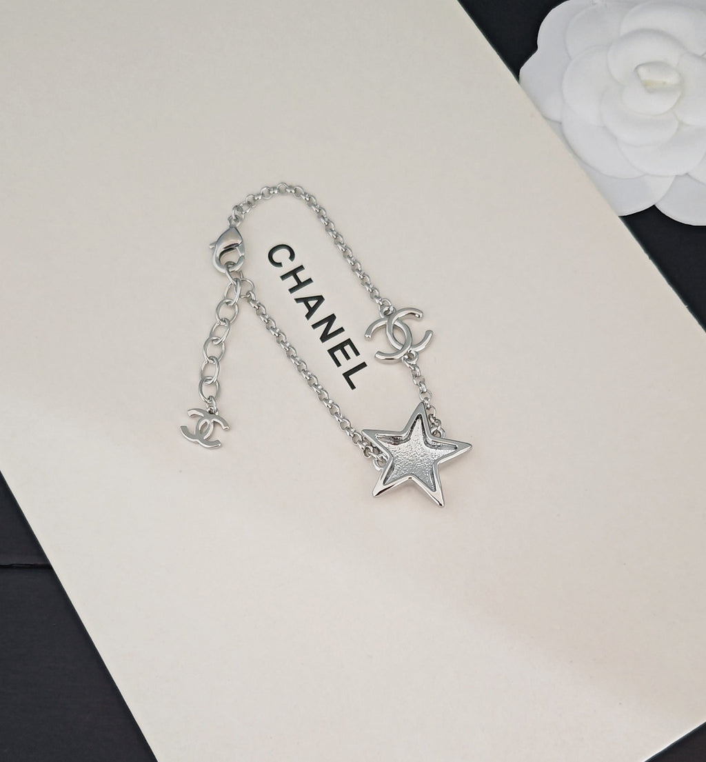 Signature Emblem Bracelet in Gold-Tone – White Detail front product view