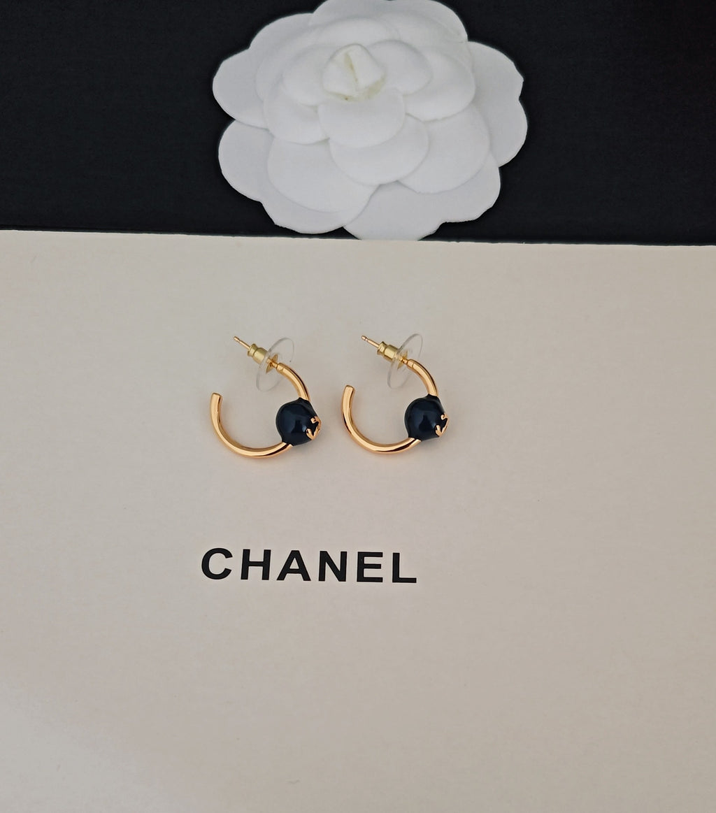 Signature Emblem Jewelry Accessory in Gold-Tone – Blue Detail side detail