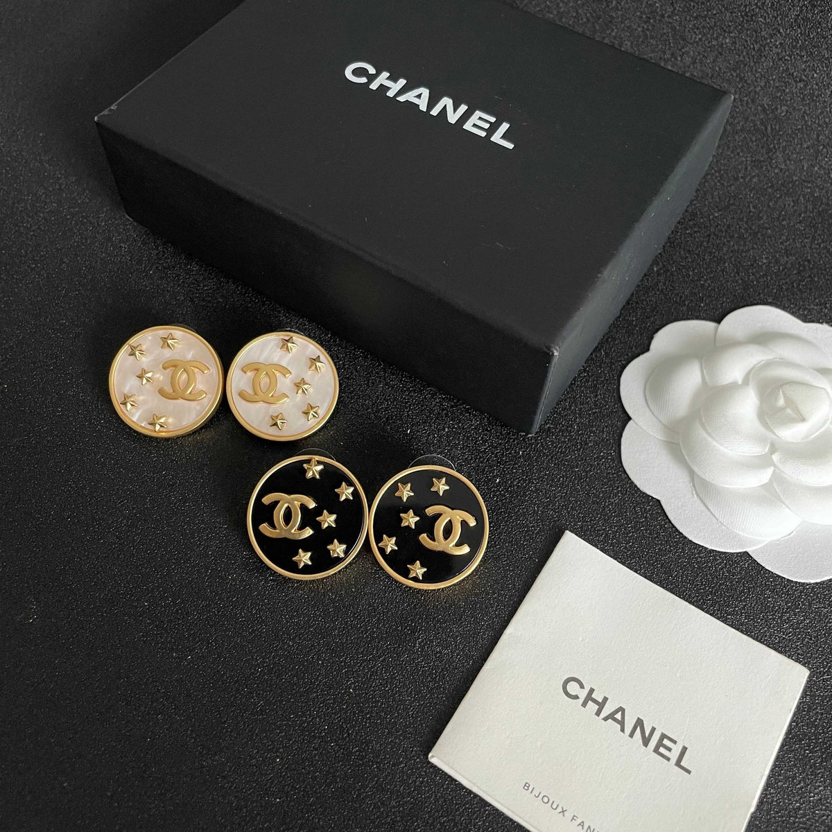 Double-C Emblem Stud Earrings in Polished Metal-Tone – Star Detail – Design 015 close-up detail