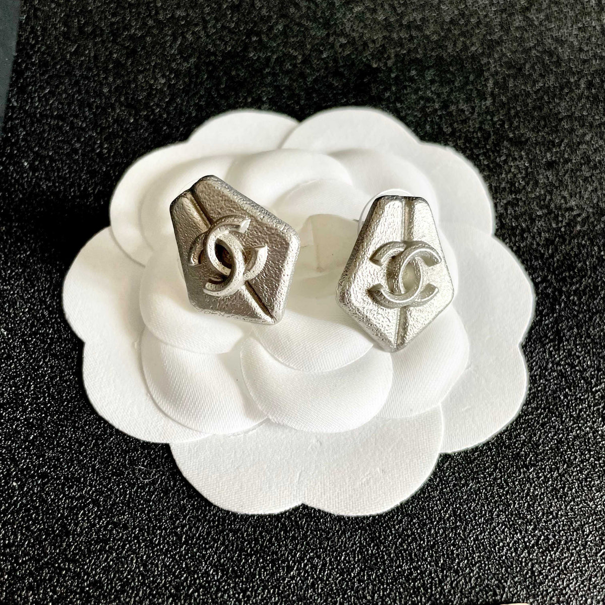 Double-C Emblem Stud Earrings in Polished Metal-Tone – Design 288 front product view