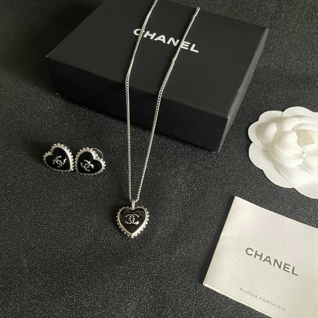 Double-C Emblem Pendant Necklace in Polished Metal-Tone – Heart Detail – Design 003 close-up detail