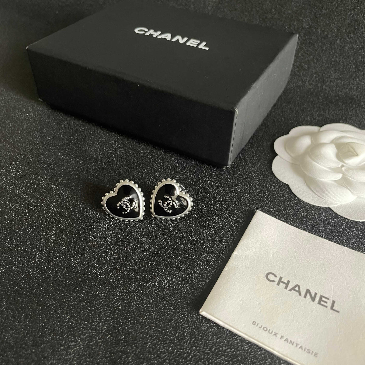 Double-C Emblem Stud Earrings in Polished Metal-Tone – Heart Detail – Design 010 close-up detail