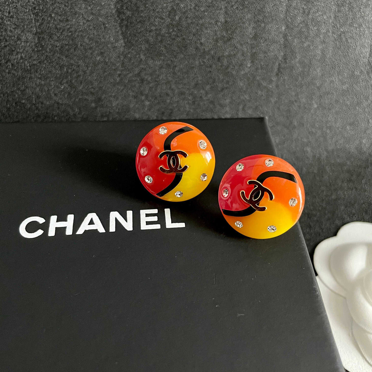 Double-C Emblem Stud Earrings in Polished Metal-Tone – Design 335 detail view