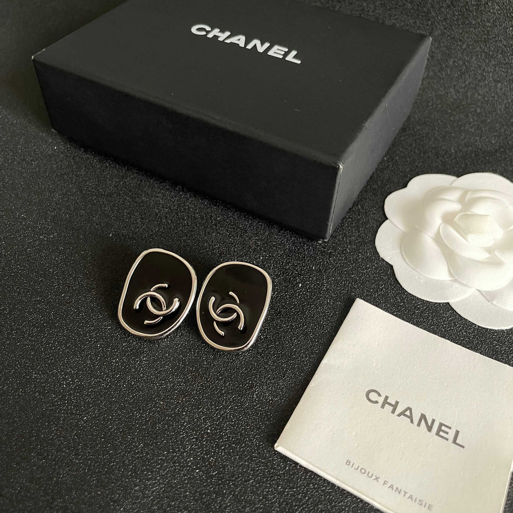 Double-C Emblem Stud Earrings in Polished Metal-Tone – Design 331 close-up detail
