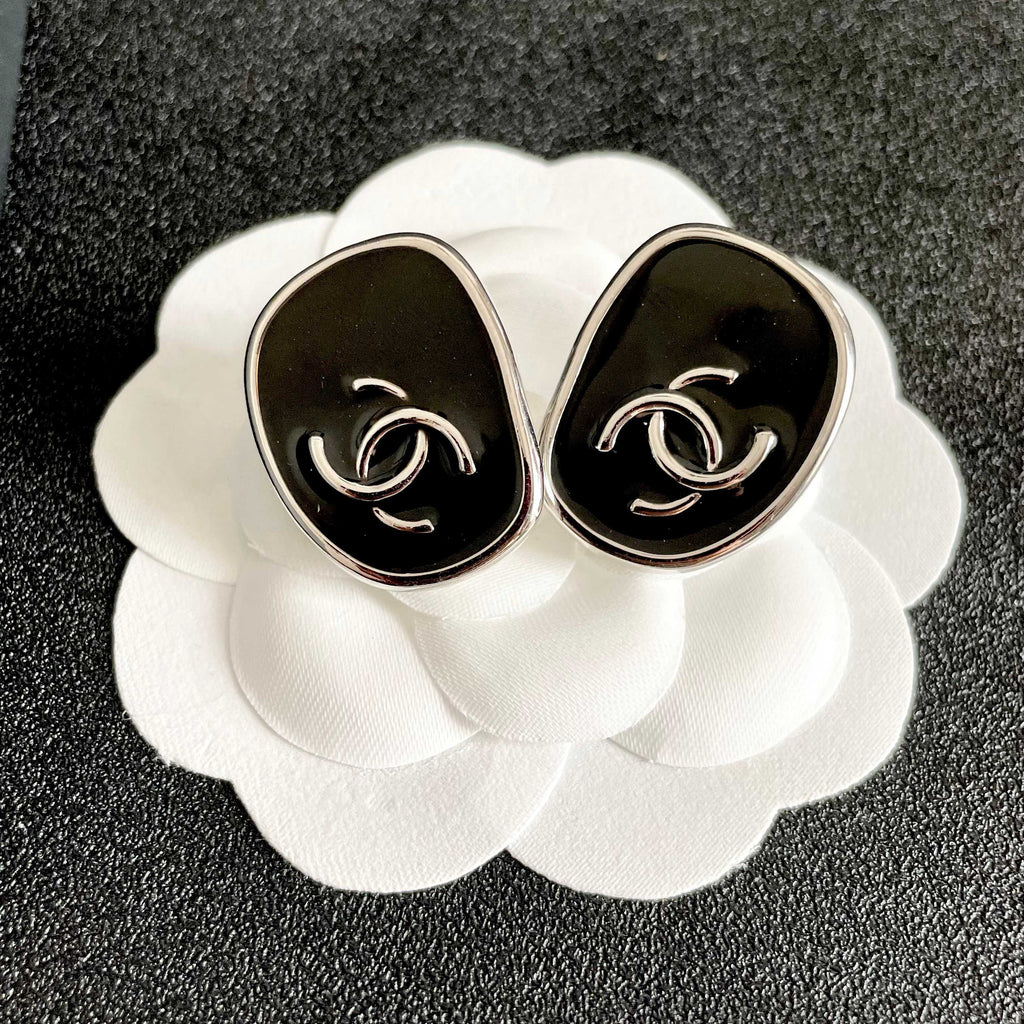 Double-C Emblem Stud Earrings in Polished Metal-Tone – Design 331 front product view