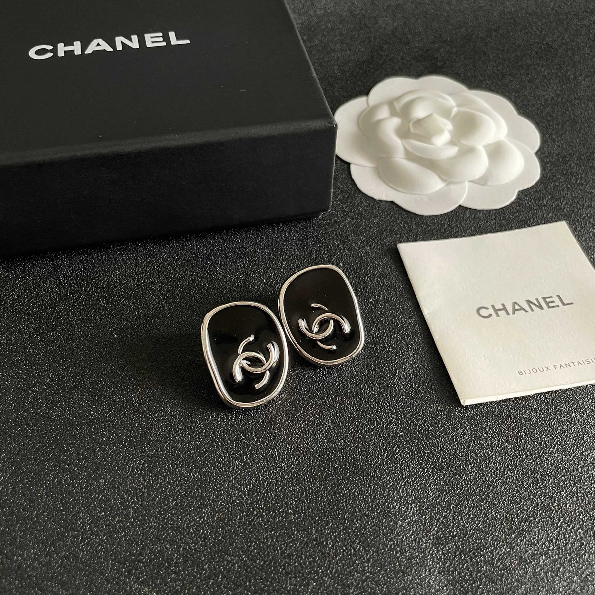 Double-C Emblem Stud Earrings in Polished Metal-Tone – Design 313 styled product view