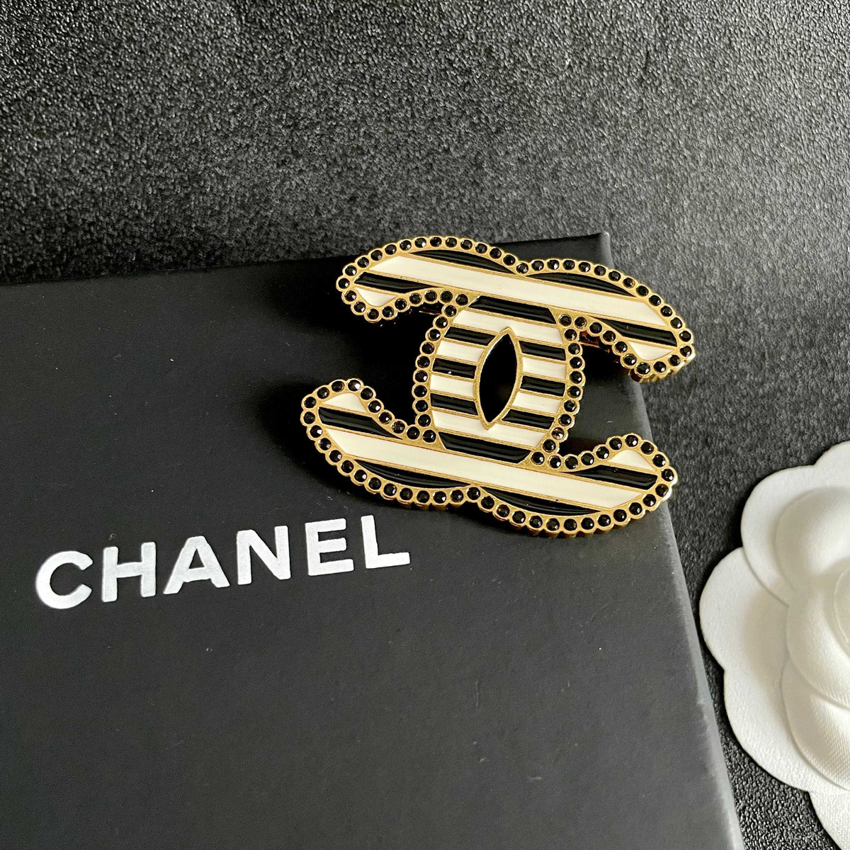 Double-C Emblem Brooch in Polished Metal-Tone – Design 066 detail view
