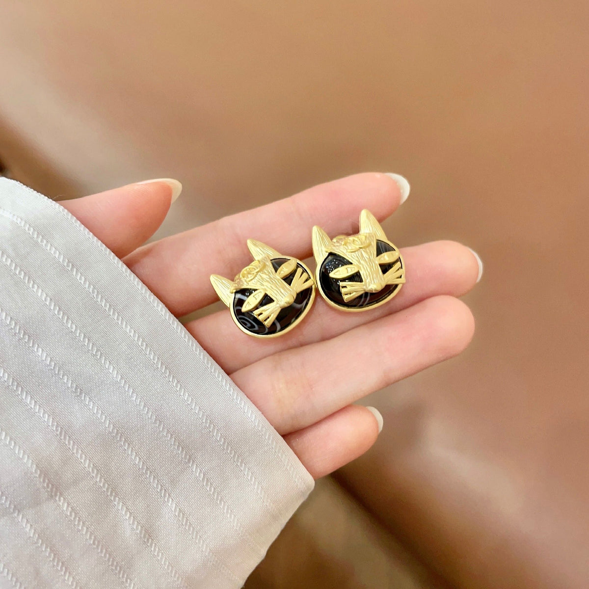 Signature Emblem Stud Earrings in Polished Metal-Tone – Design 076 side detail