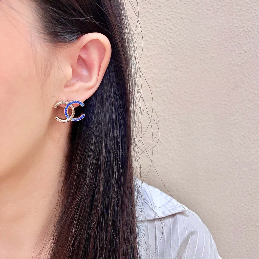 Signature Emblem Stud Earrings in Polished Metal-Tone – Design 074 detail view