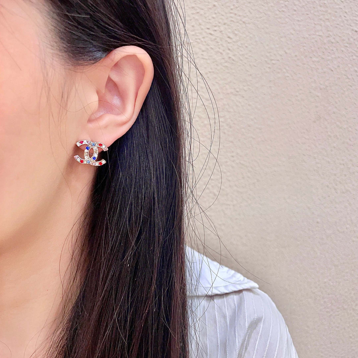 Signature Emblem Stud Earrings in Polished Metal-Tone – Design 070 detail view