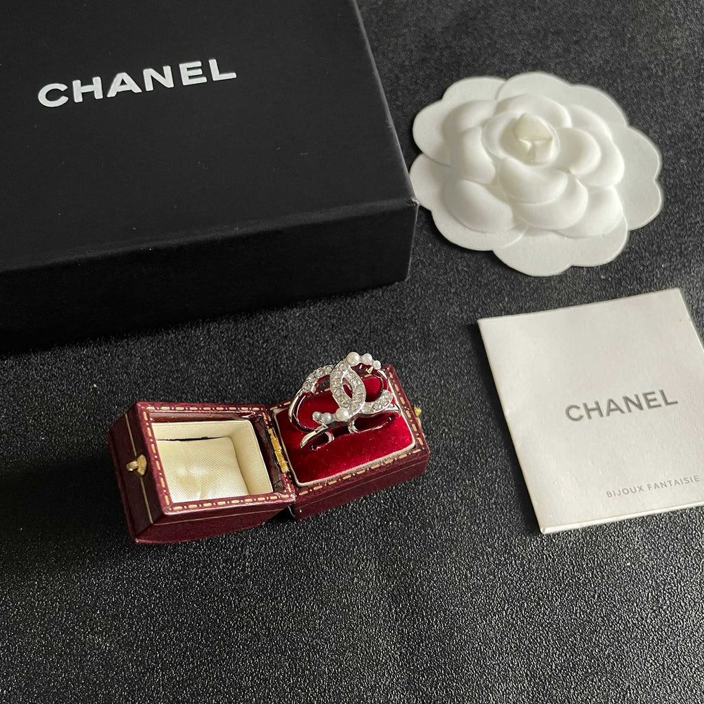 Double-C Emblem Statement Ring in Polished Metal-Tone – White Detail – Design 002 styled product view