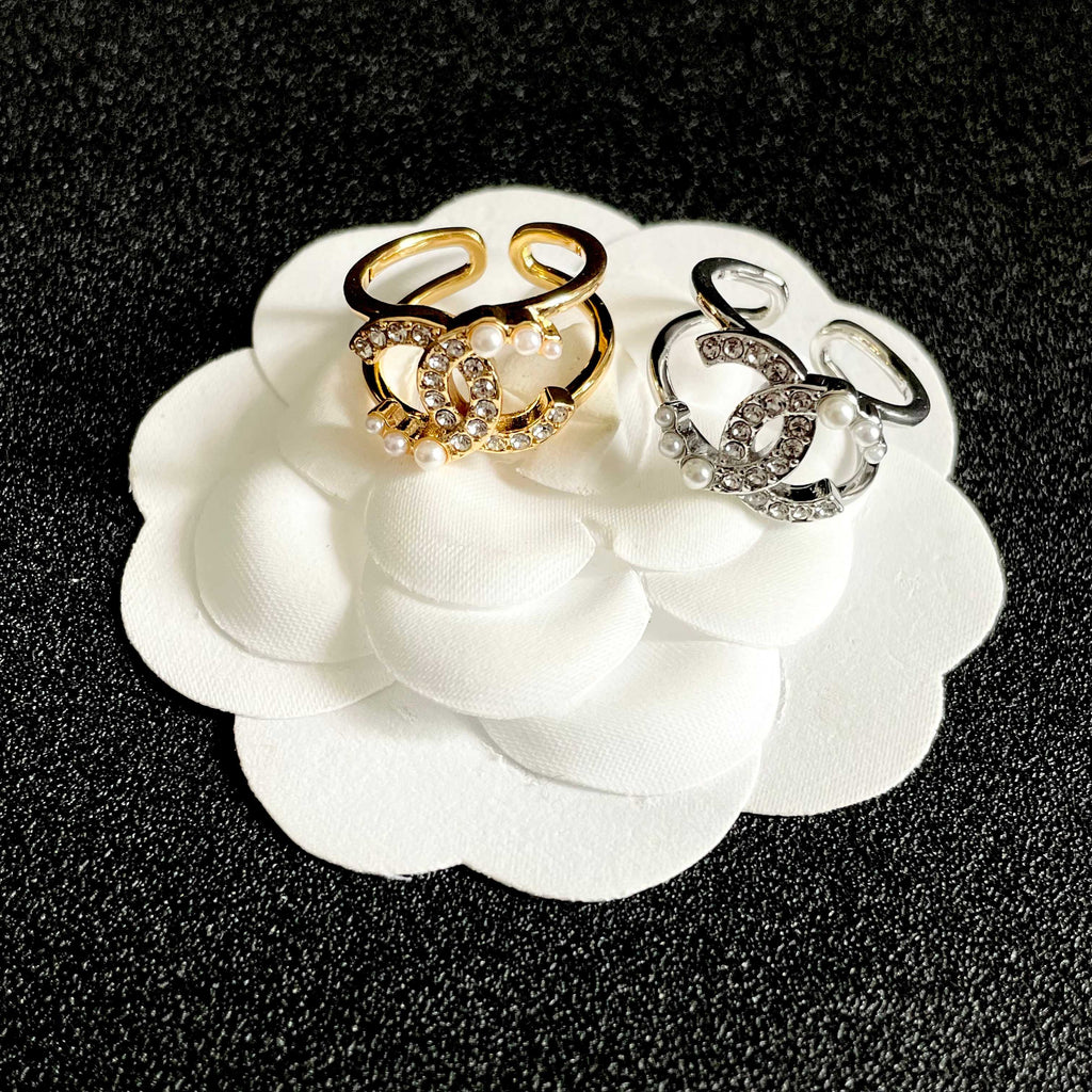 Double-C Emblem Statement Ring in Polished Metal-Tone – White Detail detail view