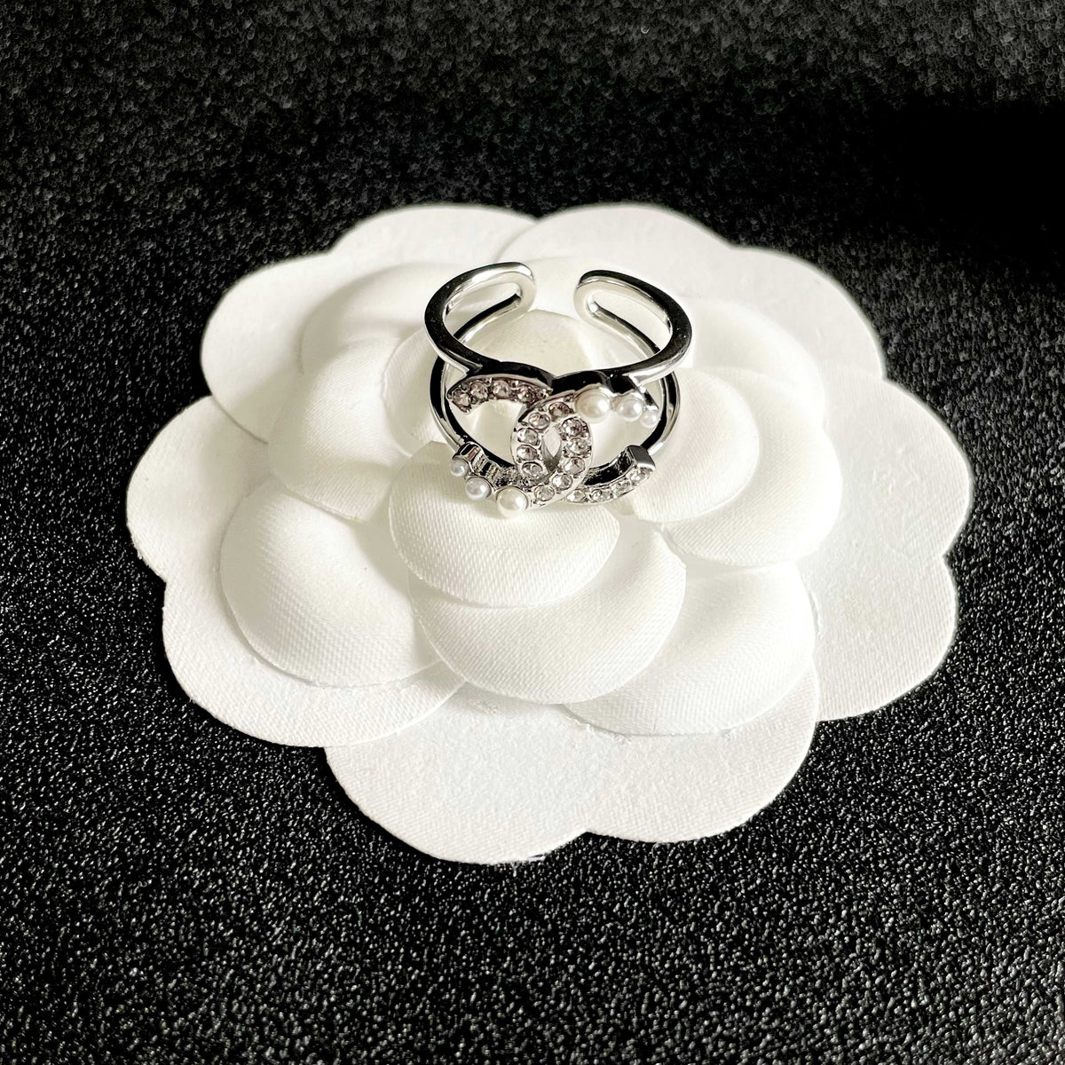 Double-C Emblem Statement Ring in Polished Metal-Tone – White Detail – Design 002 front product view