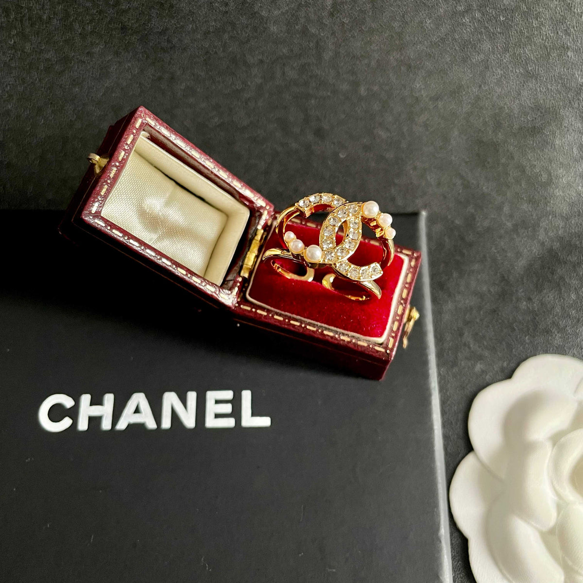 Double-C Emblem Statement Ring in Polished Metal-Tone – White Detail front product view