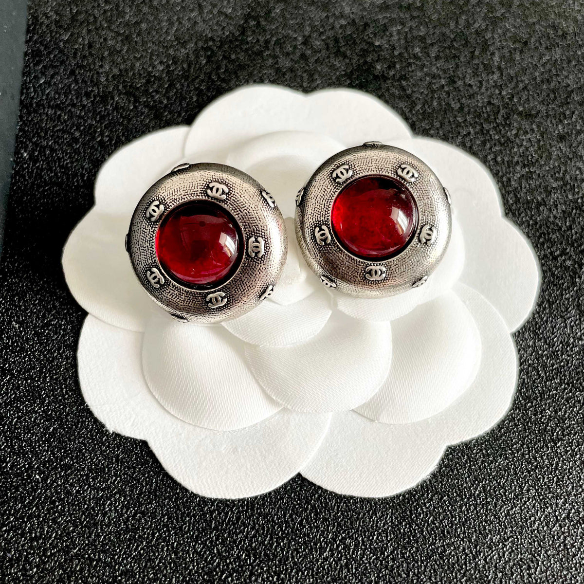 Double-C Emblem Stud Earrings in Polished Metal-Tone – Design 170 front product view