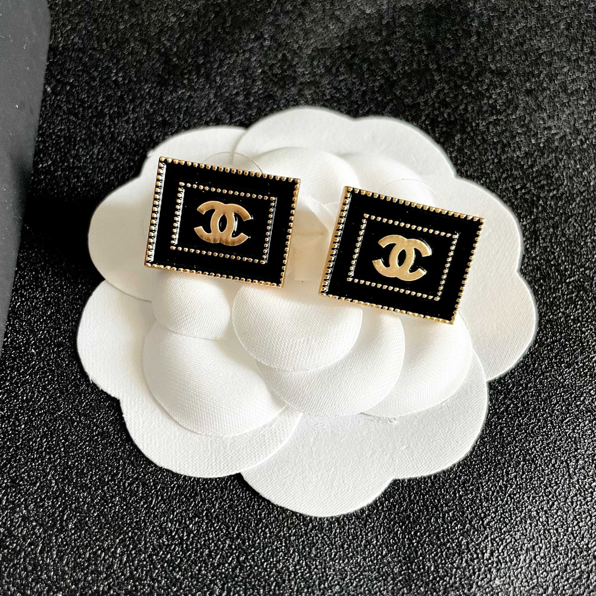 Double-C Emblem Stud Earrings in Polished Metal-Tone – Design 352 front product view