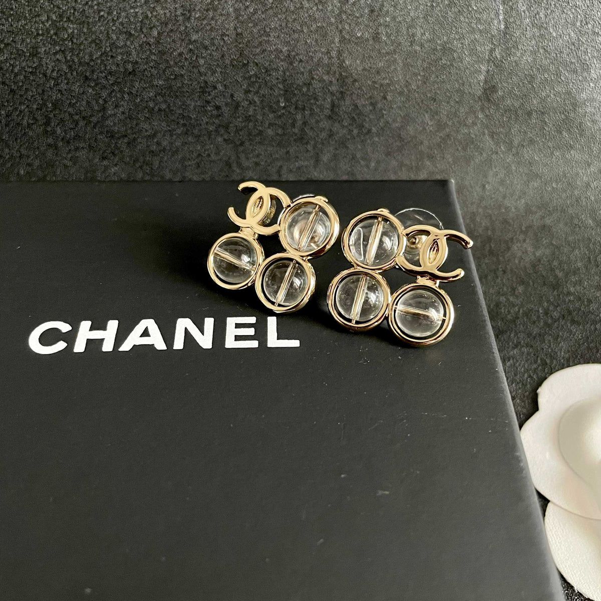 Double-C Emblem Stud Earrings in Polished Metal-Tone – Design 373 detail view