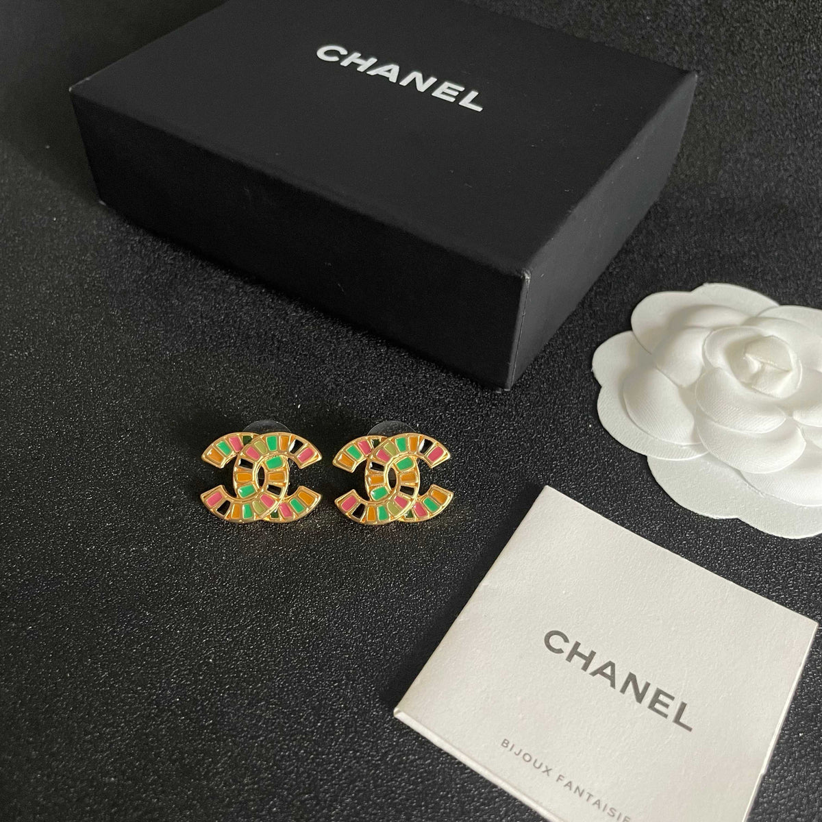 Double-C Emblem Stud Earrings in Polished Metal-Tone – Design 180 close-up detail