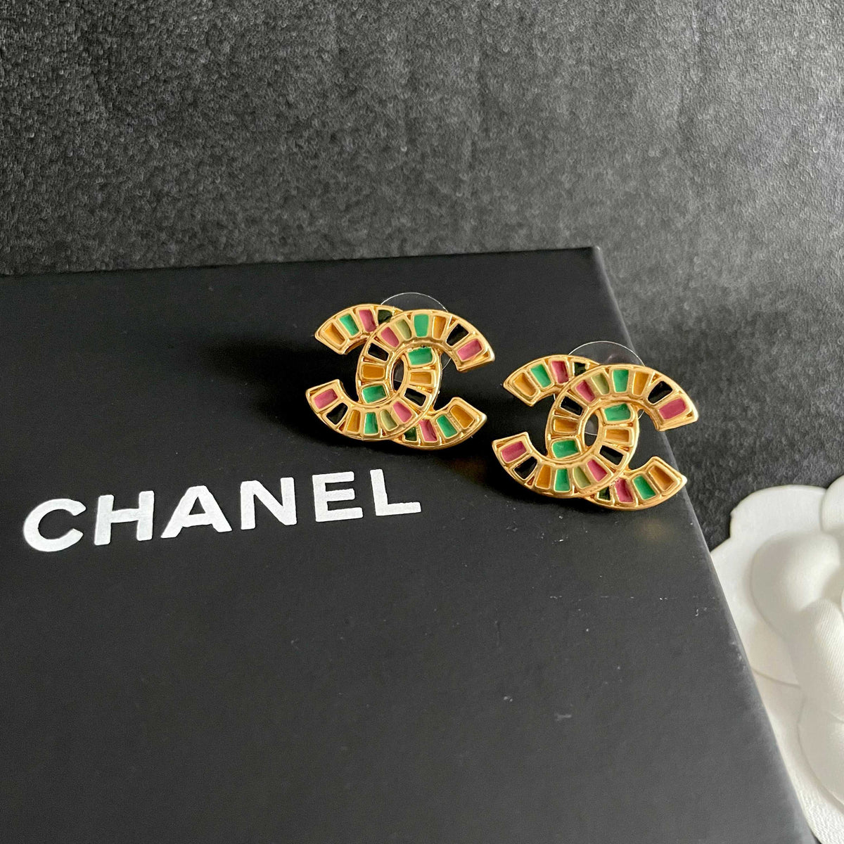 Double-C Emblem Stud Earrings in Polished Metal-Tone – Design 180 detail view