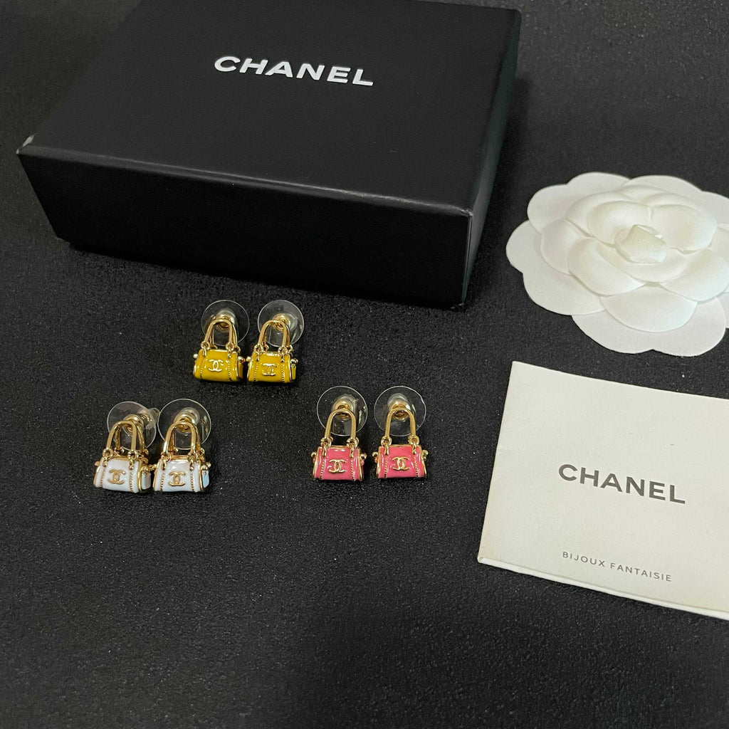 Signature Emblem Stud Earrings in Polished Metal-Tone – Design 101 close-up detail