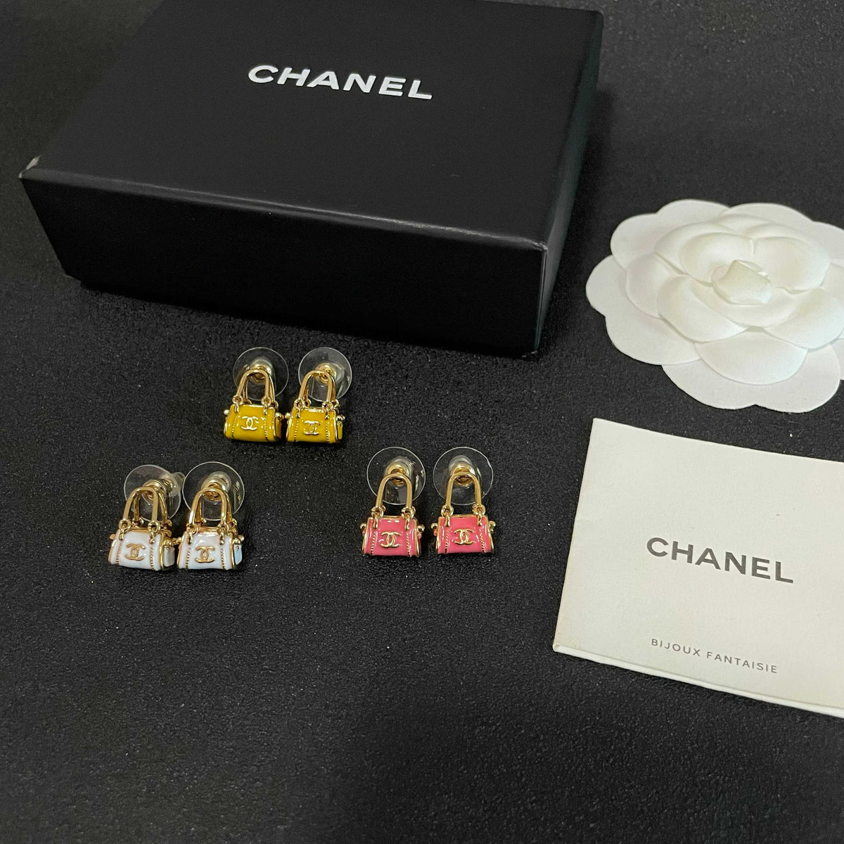 Signature Emblem Stud Earrings in Polished Metal-Tone – Design 101 close-up detail