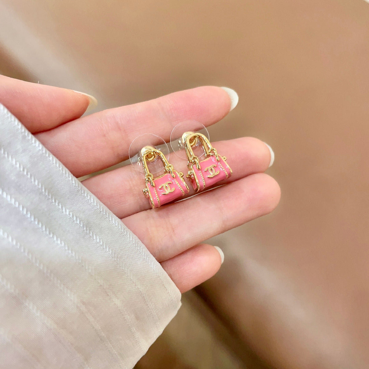 Signature Emblem Stud Earrings in Polished Metal-Tone – Design 101 side detail