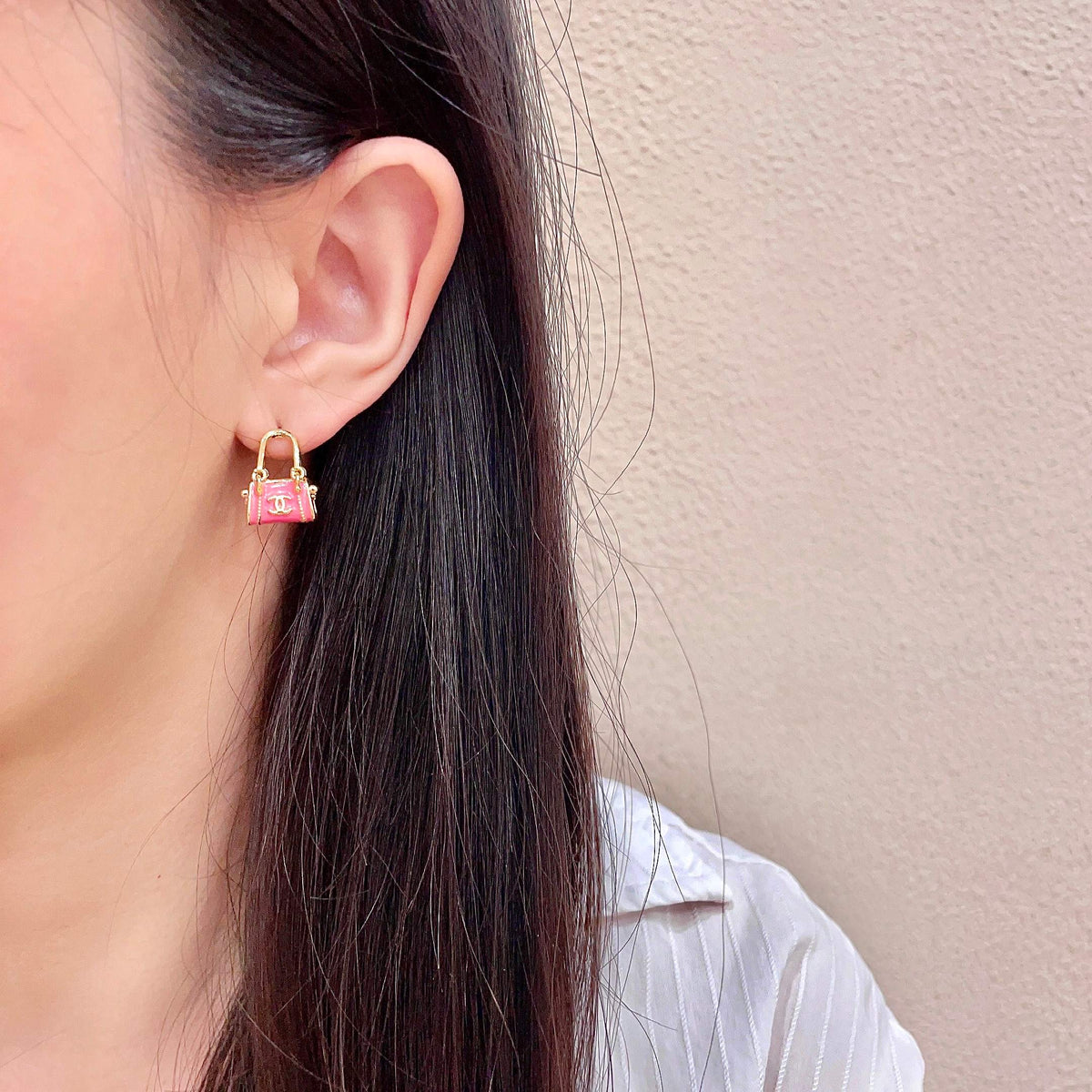 Signature Emblem Stud Earrings in Polished Metal-Tone – Design 101 detail view
