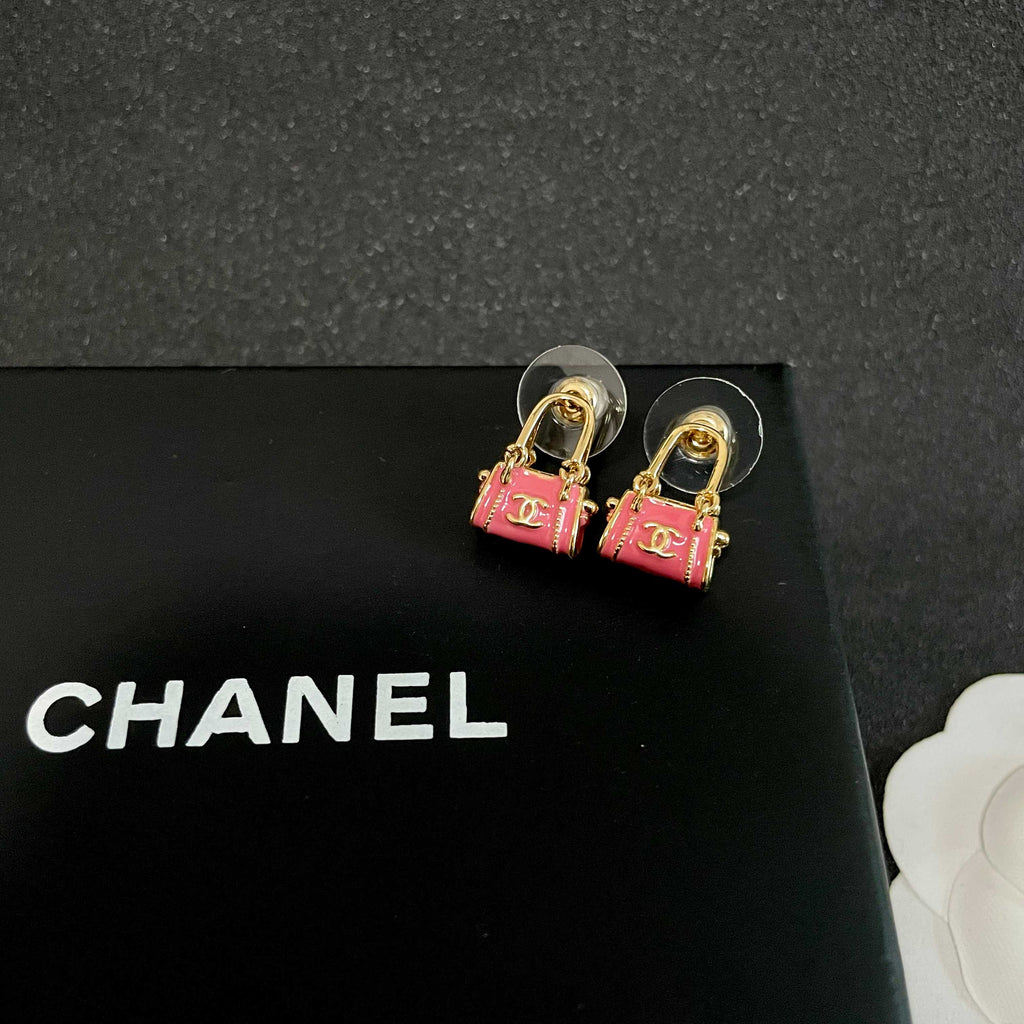 Signature Emblem Stud Earrings in Polished Metal-Tone – Design 101 detail view