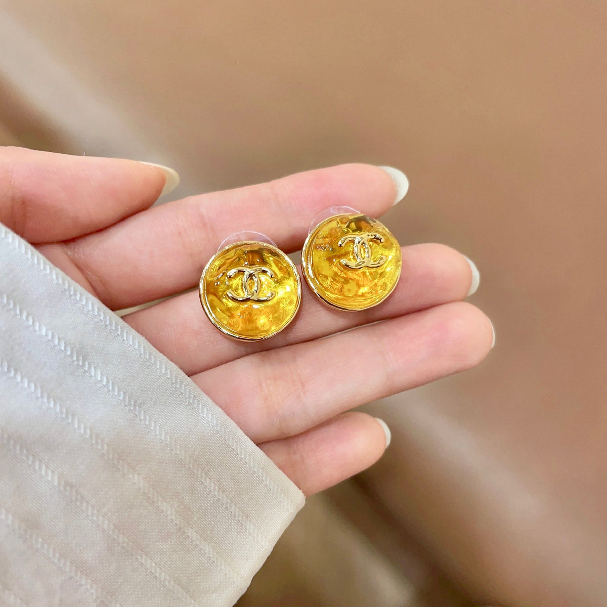 Signature Emblem Stud Earrings in Polished Metal-Tone – Design 100 side detail