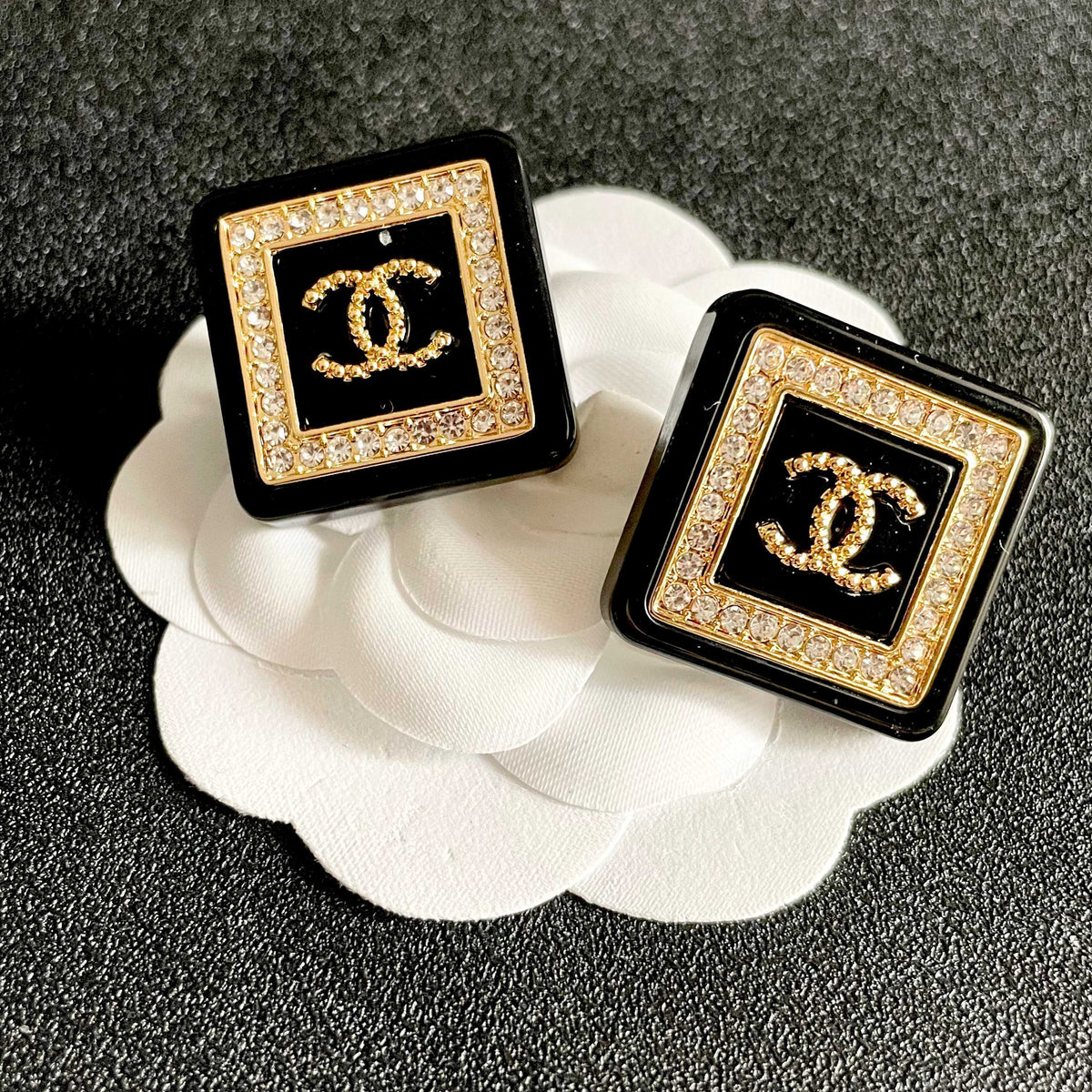 Double-C Emblem Stud Earrings in Polished Metal-Tone – Design 304 front product view