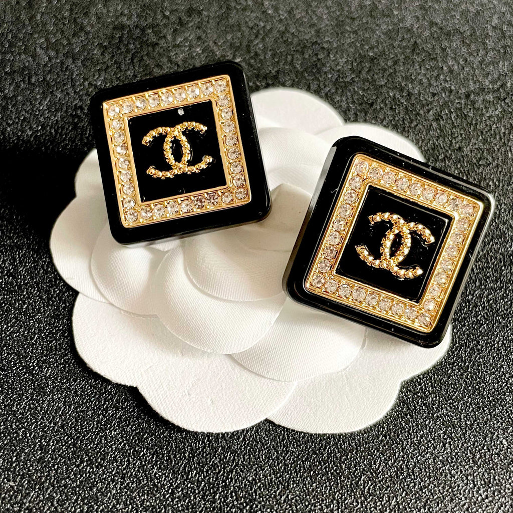 Double-C Emblem Stud Earrings in Polished Metal-Tone – Design 388 front product view
