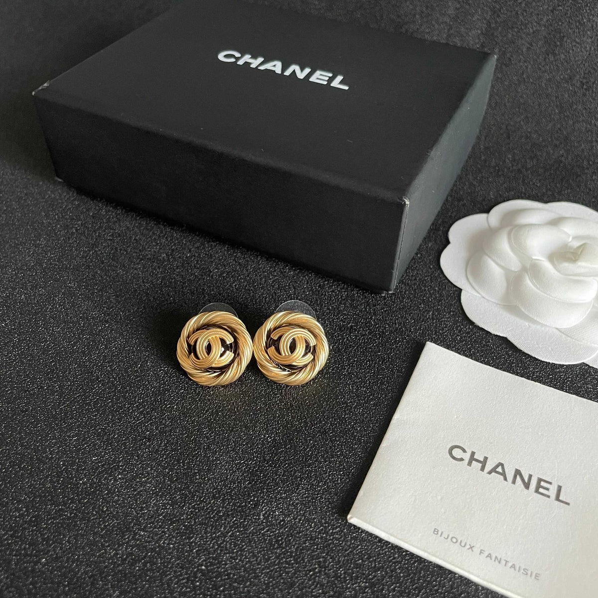 Double-C Emblem Stud Earrings in Polished Metal-Tone – Design 303 close-up detail
